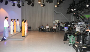 The filming processes for awareness songs to promote a successful multiparty democracy general election in progress at MRTV in Yangon yesterday, watched by Union Minister U Maung Maung Ohn.