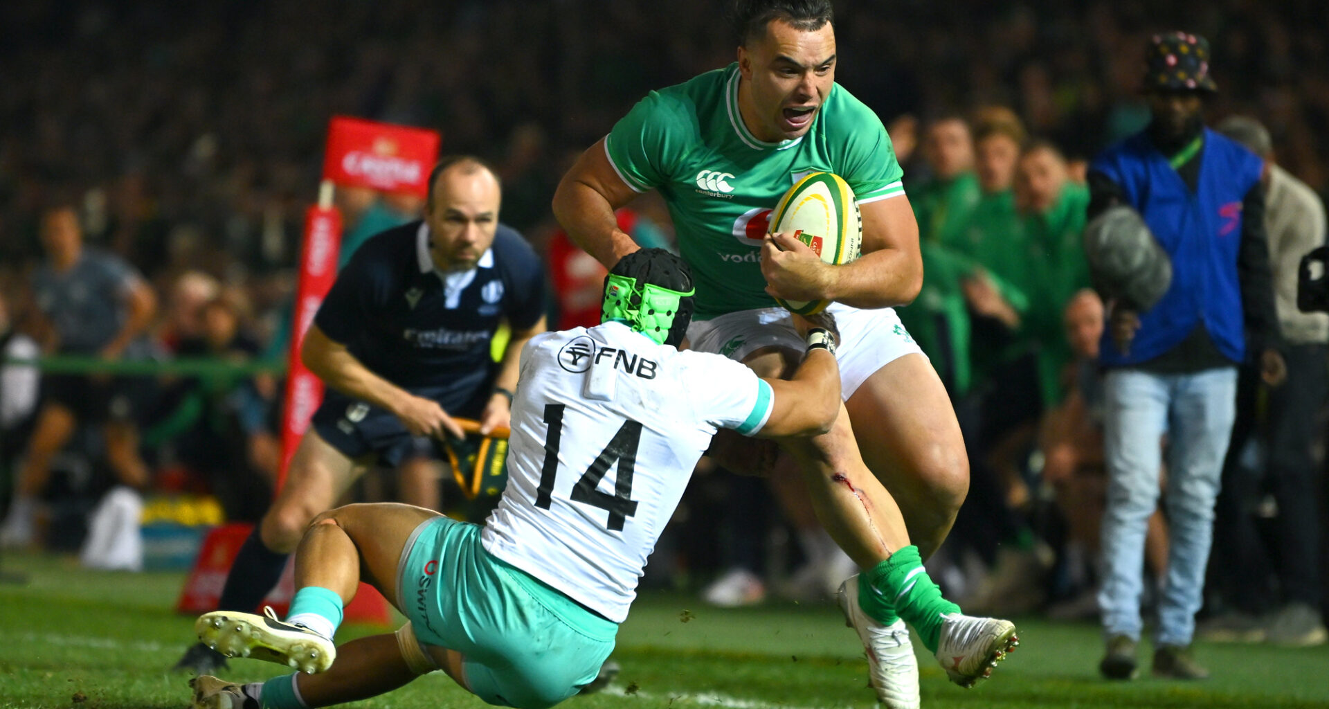 Ireland's James Lowe is tackled by South Africa's Cheslin Kolbe during the 2024 Test in Pretoria