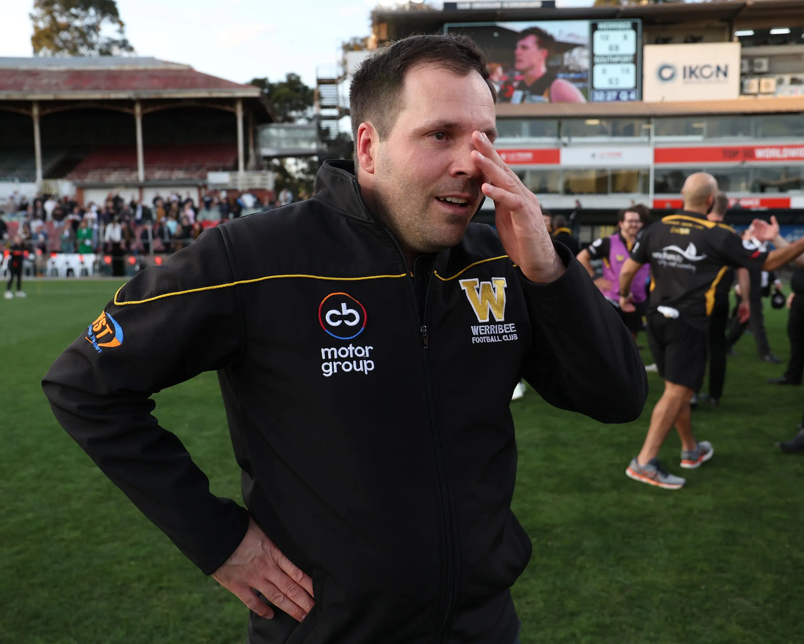 MELBOURNE, AUSTRALIA - SEPTEMBER 22: An emotional Werribee coach Jimmy Allan celebrates after winning the 2024 VFL Grand Final match between Werribee and the Southport Sharks at IKON Park on September 22, 2024 in Melbourne, Australia. (Photo by Rob Lawson/AFL Photos via Getty Images)