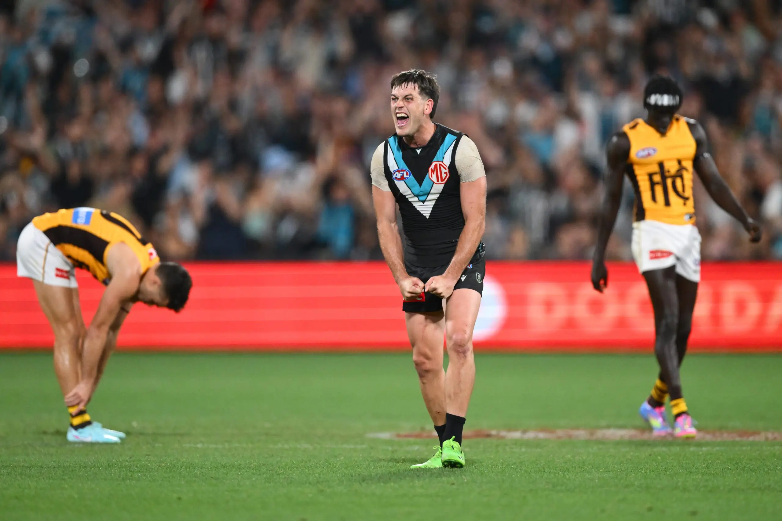 ADELAIDE, AUSTRALIA - APRIL 13: Zak Butters of the Power celebrates at full time during the round five AFL match between Port Adelaide Power and Hawthorn Hawks at Adelaide Oval, on April 13, 2025, in Adelaide, Australia. (Photo by Quinn Rooney/Getty Images)