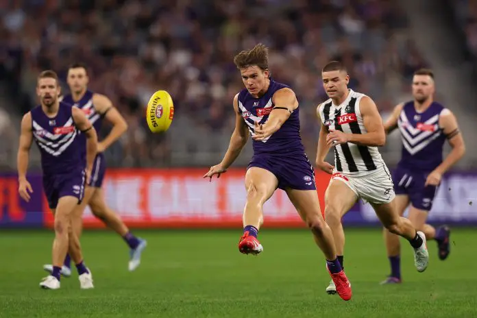 PERTH, AUSTRALIA - MAY 08: Caleb Serong of the Dockers in action during the round nine AFL match between Fremantle Dockers and Collingwood Magpies at Optus Stadium, on May 08, 2025, in Perth, Australia. (Photo by Paul Kane/Getty Images)