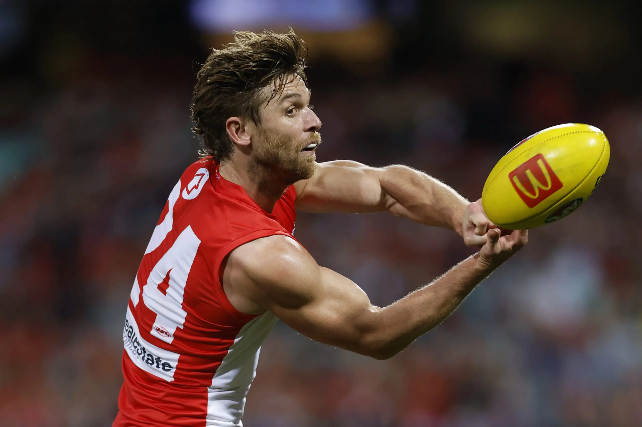 SYDNEY, AUSTRALIA - JUNE 27: Dane Rampe of the Swans handballs during the round 16 AFL match between Sydney Swans and Western Bulldogs at Sydney Cricket Ground on June 27, 2025 in Sydney, Australia. (Photo by Darrian Traynor/AFL Photos/via Getty Images)