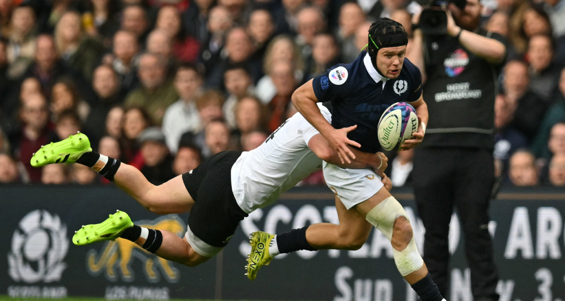 New Zealand's Leroy Carter tackles Scotland's Darcy Graham during the 2025 Autumn Nations Series match in Edinburgh