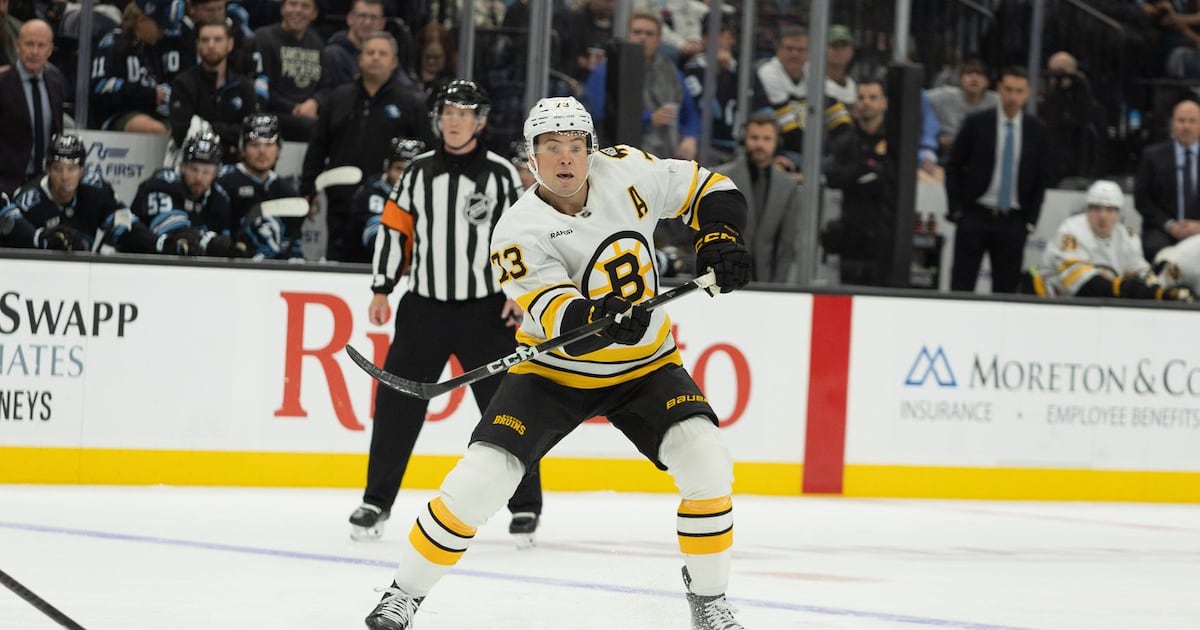 Bruins' Charlie McAvoy exits game against Canadiens after receiving shot to face