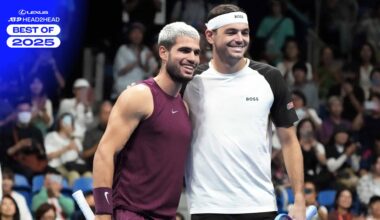 Carlos Alcaraz and Taylor Fritz pose for pictures before the championship match in Tokyo.