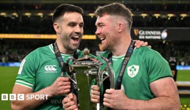 Conor Murray and Peter O'Mahony celebrate with the Six Nations trophy.