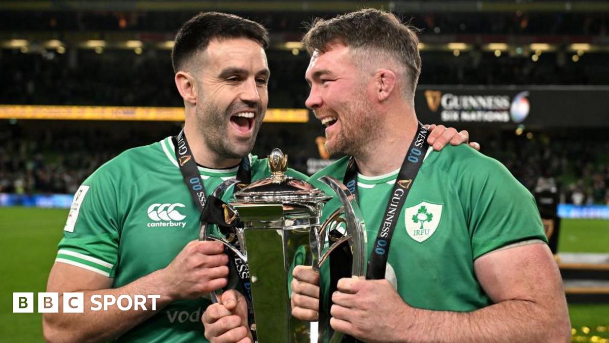 Conor Murray and Peter O'Mahony celebrate with the Six Nations trophy.