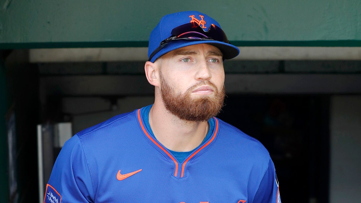 Brandon Nimmo looks on