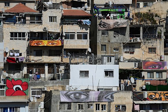 All eyes on East Jerusalem: Murals on the houses of the Batn al-Hawa neighbourhood seek to draw attention to the eviction of Palestinians from their homes.