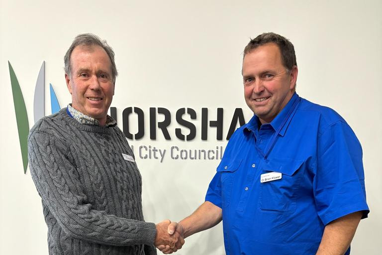 HRCC mayor Ian Ross congratulating Wym Wyn Ward councillor Brian Klowss on his election after the November 2024 elections.
