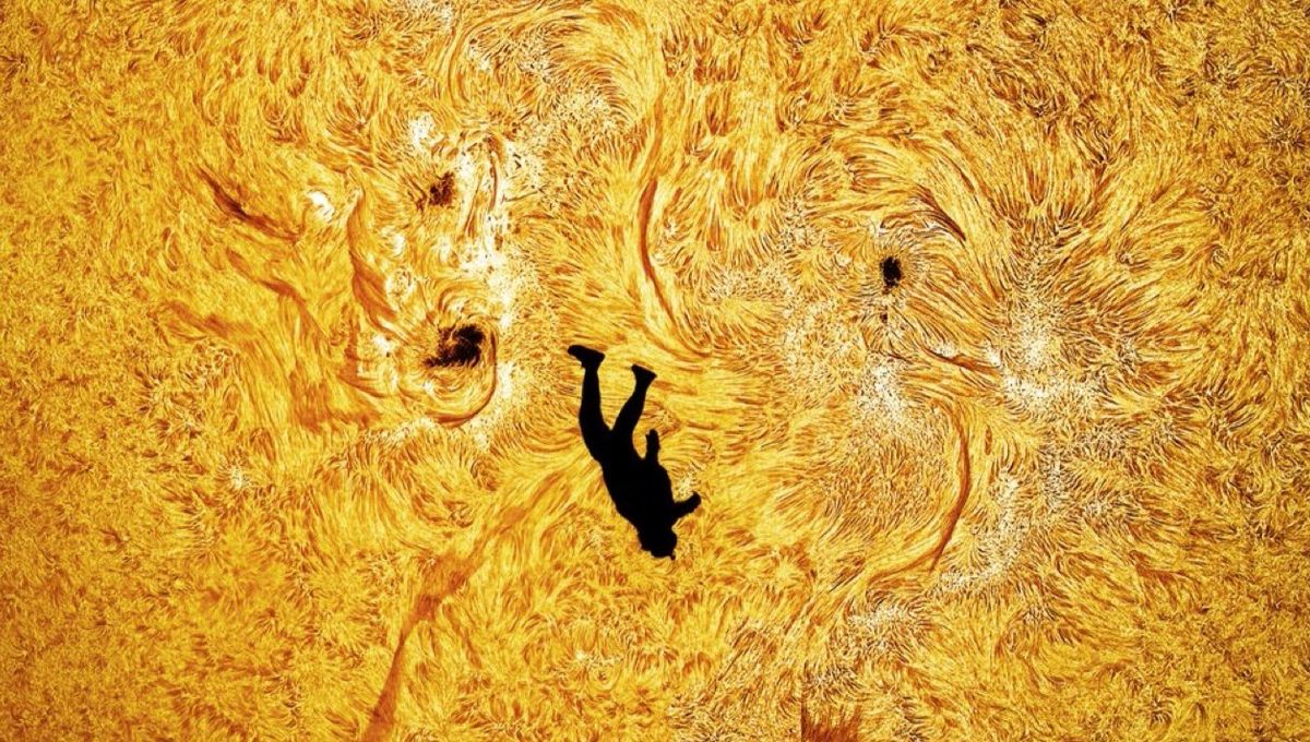 “The Fall Of Icarus”: Astrophotographer Snaps Skydiver Falling In Front Of The Sun In Spectacular Photo