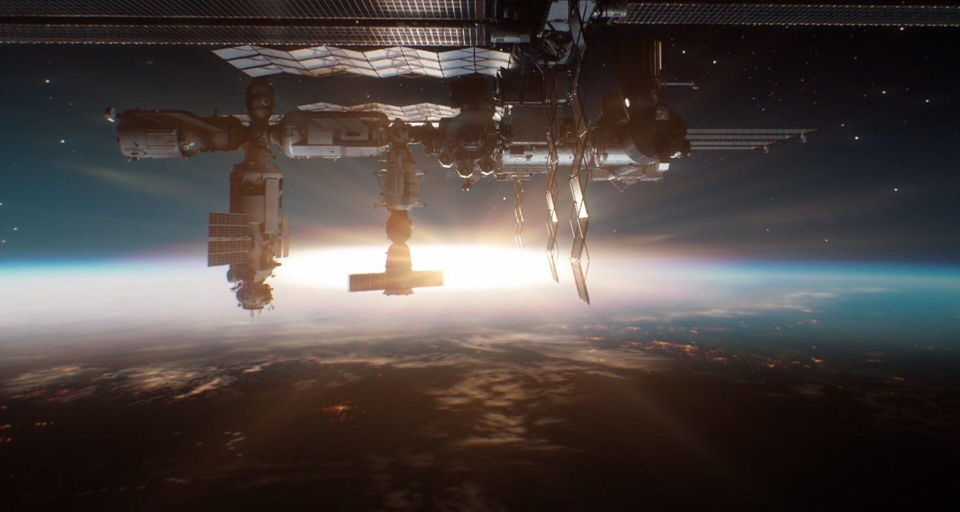 an image of the International Space Station in orbit above Earth