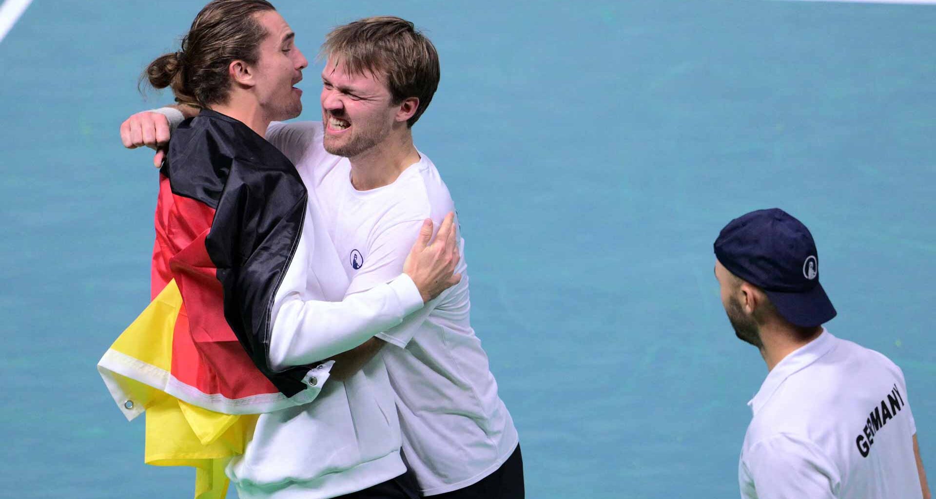 Alexander Zverev, Kevin Krawietz and Tim Puetz celebrate Germany's victory against Argentina Thursday evening.