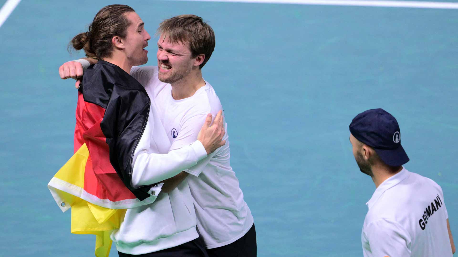 Alexander Zverev, Kevin Krawietz and Tim Puetz celebrate Germany's victory against Argentina Thursday evening.