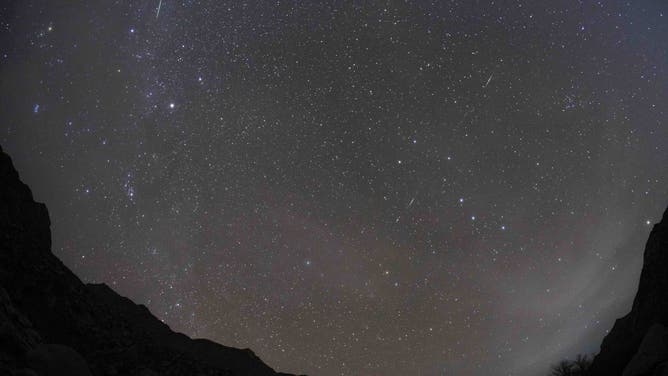 FILE- BAZHOU, CHINA - NOVEMBER 17. 2021 - Starry sky over Hora Mountain in Bayingoleng Mongolian Autonomous Prefecture, Northwest China's Xinjiang Uygur Autonomous Region, on the early morning of November 17, 2021. On winter nights, the Leonid meteor shower is coming.