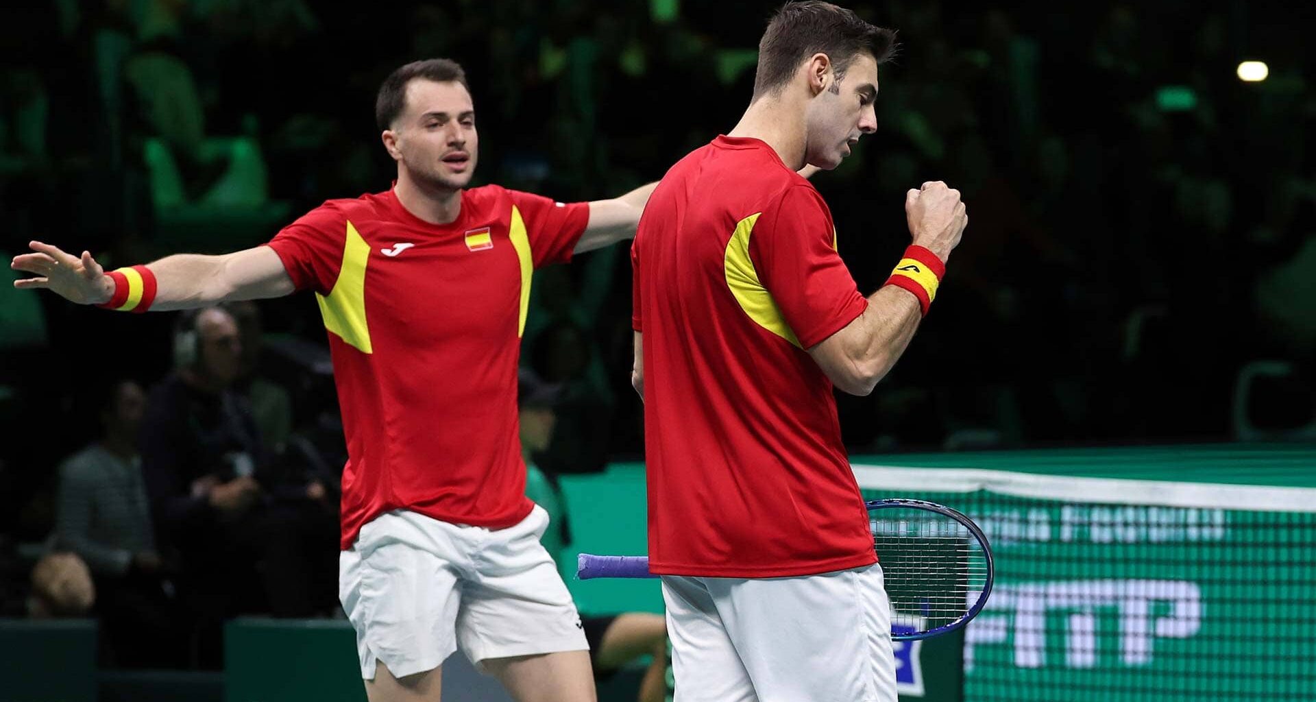 Spain's Pedro Martinez and Marcel Granollers celebrate on Saturday in Bologna.