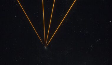 A series of golden lines converging to one point in a starry night in the center of the image