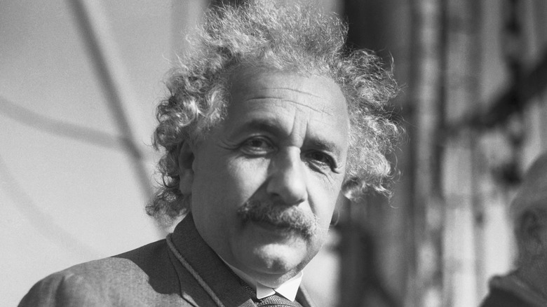 Physicist Albert Einstein outdoors