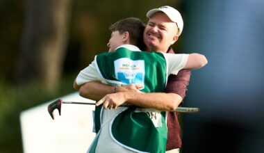 James Morrison hugs son Finley after winning the Rolex Grand Final to earn a DP World Tour card for next season.