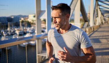 Mature man running on a bridge in the city