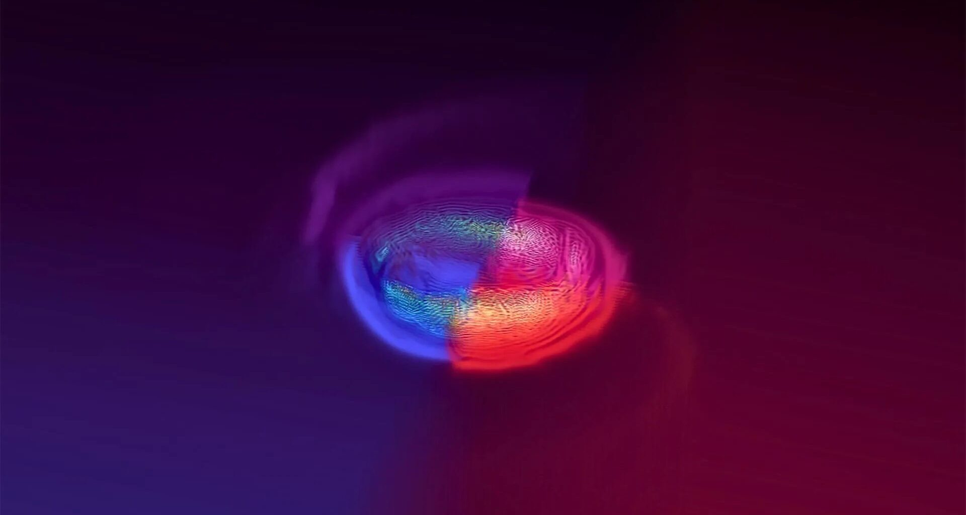 A simulation of a neutron star merger, with two two stars colored red and blue. Credit: David Radice research group / Penn State