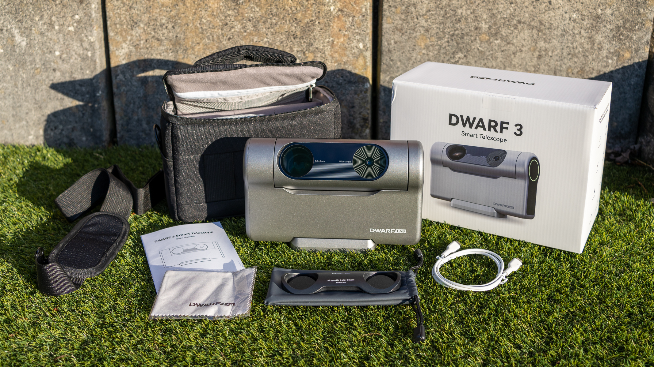 The DWARFLAB DWARF 3 set including all accessories placed against a wall on the grass.