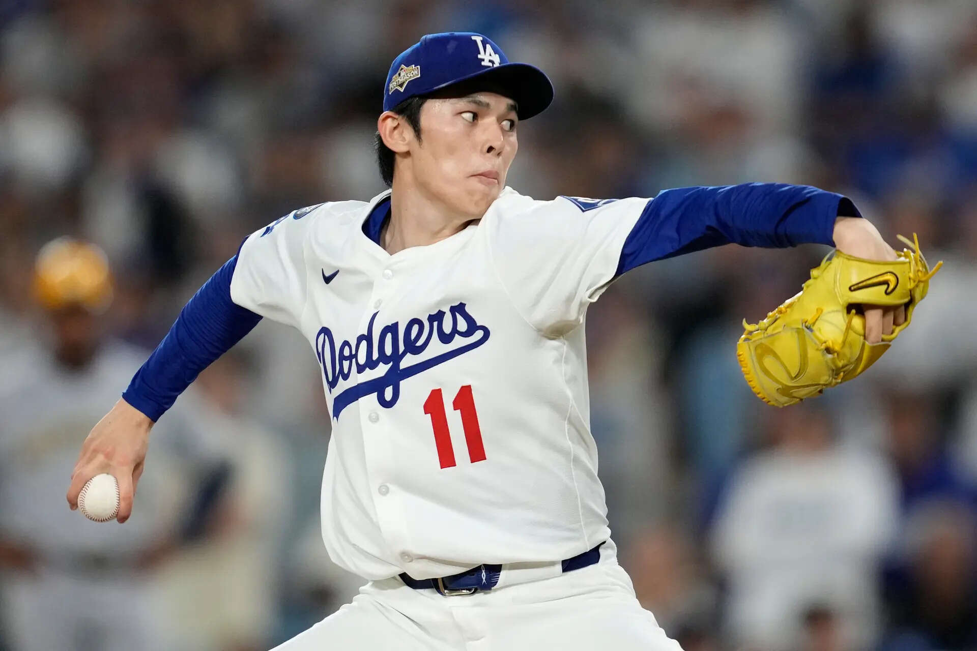 Los Angeles Dodgers pitcher Roki Sasaki throws against the Milwaukee Brewers during the ninth inning in Game 4 of baseball's National League Championship Series, Friday, Oct. 17, 2025, in Los Angeles. (AP Photo/Ashley Landis) Trey Yesavage and Roki Sasaki just arrived in the majors. They've been postseason stars anyway