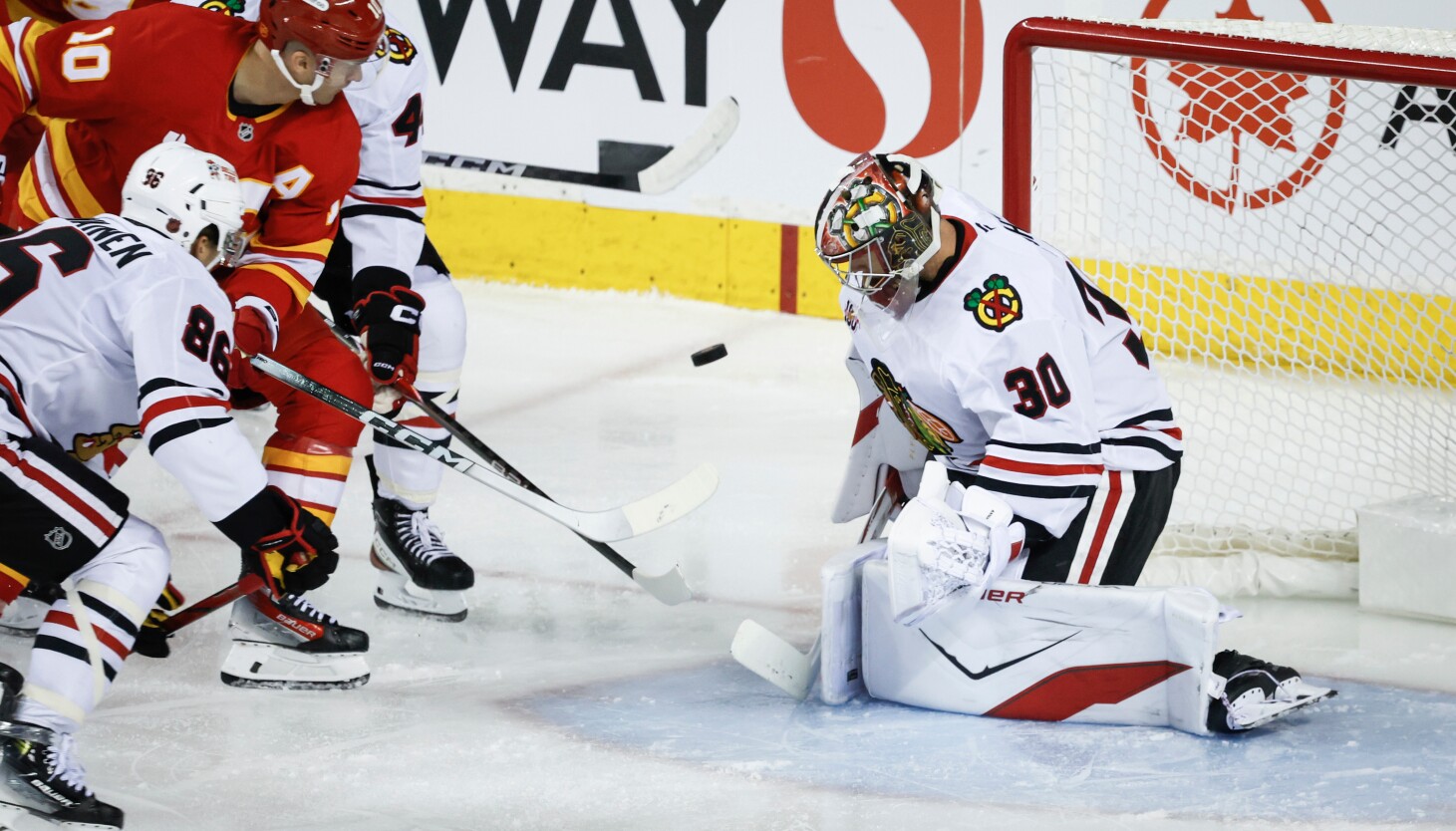 Spencer Knight, Connor Bedard help Blackhawks pound Flames despite Frank Nazar's injury