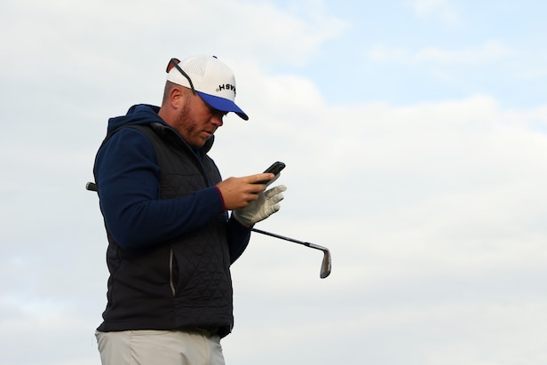 Stupid Golf Problems: I'm on my phone the whole round. Does the rest of the group hate me?