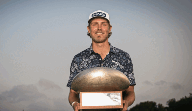 Kristoffer Reitan poses with the Challenge Tour Grand Final trophy after winning in 2024