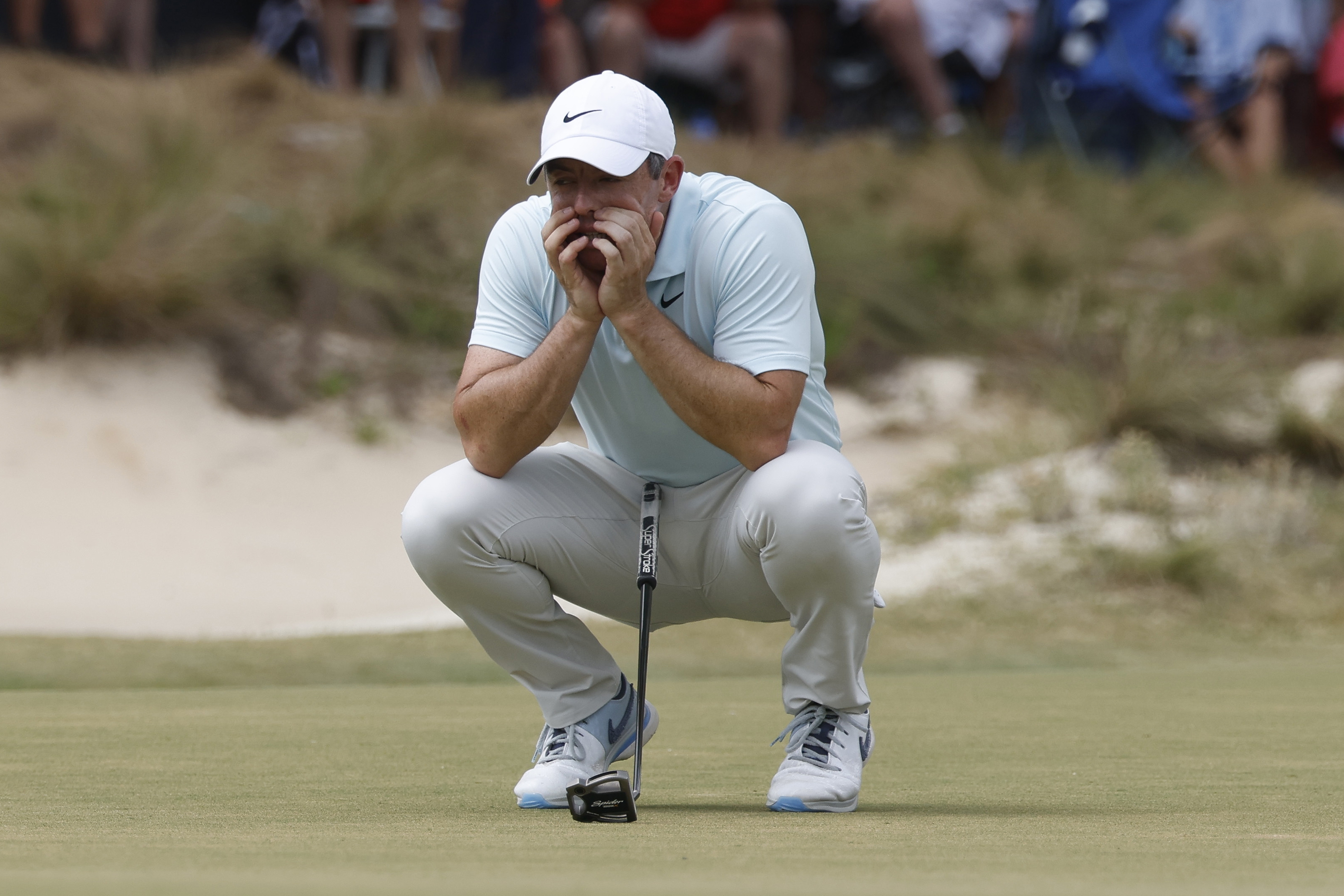 Rory McIlroy of Northern Ireland reacts after a bogey putt on the fifth green during the final round of the 2024 US Open golf tournament.