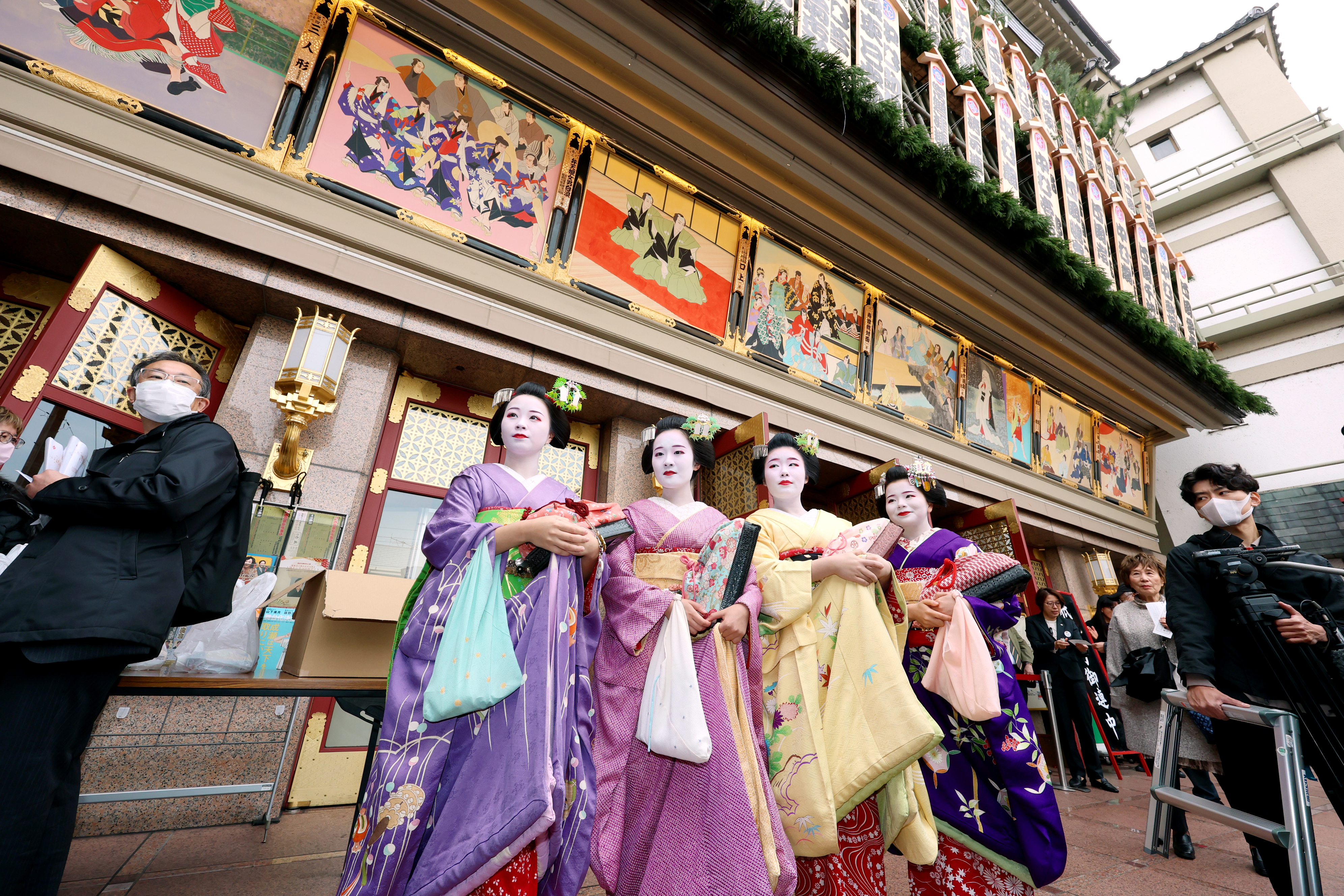 Maiko from the Gion Kobu district attend the annual Kaomise performance in Kyoto, Japan.