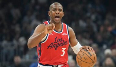 Los Angeles Clippers guard Chris Paul (3) shouts to his team as he brings the ball up the court in the first half of an NBA basketball game against the Cleveland Cavaliers Sunday, Nov. 23, 2025, in Cleveland. (AP Photo/Sue Ogrocki)