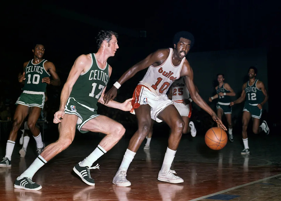 Unknown date & location; USA: FILE PHOTO; Baltimore Bullets guard Earl Monroe (10) is defended by Boston Celtics guard John Havlicek (17) at Cincinnati Gardens. Mandatory Credit: Malcolm Emmons-USA TODAY Sports