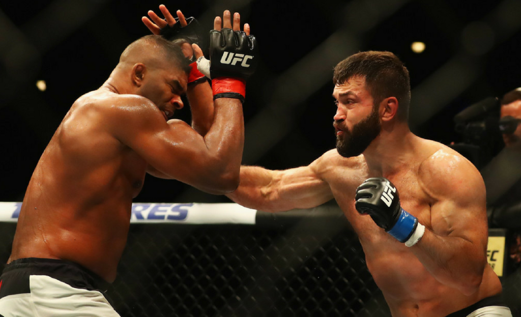 Alistair Overeem (L) of the Netherlands and Andrei Arlovski of Belarus compete in their Heavyweight bout during the UFC Fight Night 87 at Ahoy on May 8, 2016 in Rotterdam, Netherlands.