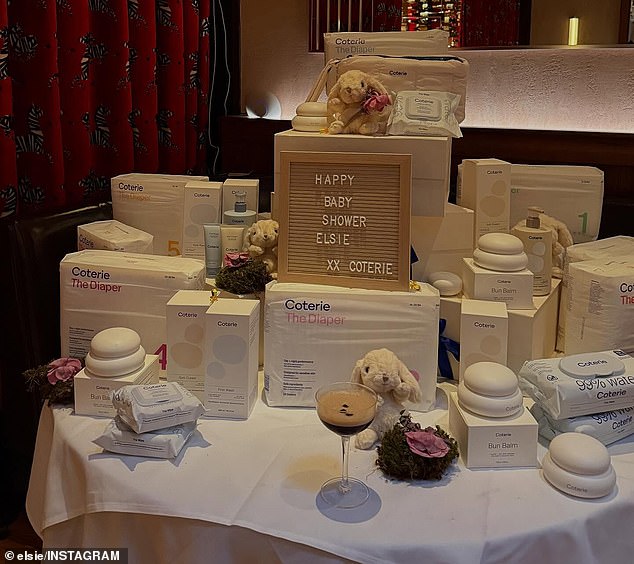 Another table inside the space had diapers from the brand Coterie and a sign that read: 'Happy baby shower Elsie xx Coterie'