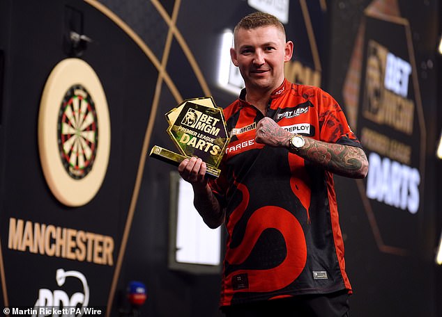 Nathan Aspinall enjoyed hometown success by winning the Premier League Darts stop in Manchester