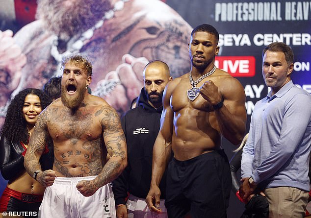 She accused Hearn, right, of being 'smug' and said that she wanted to 'punch' the promoter