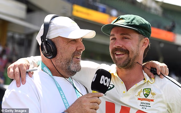 Former Australian batsman and coach Darren Lehmann (pictured left with Travis Head) wants to see the coin toss scrapped in Test cricket