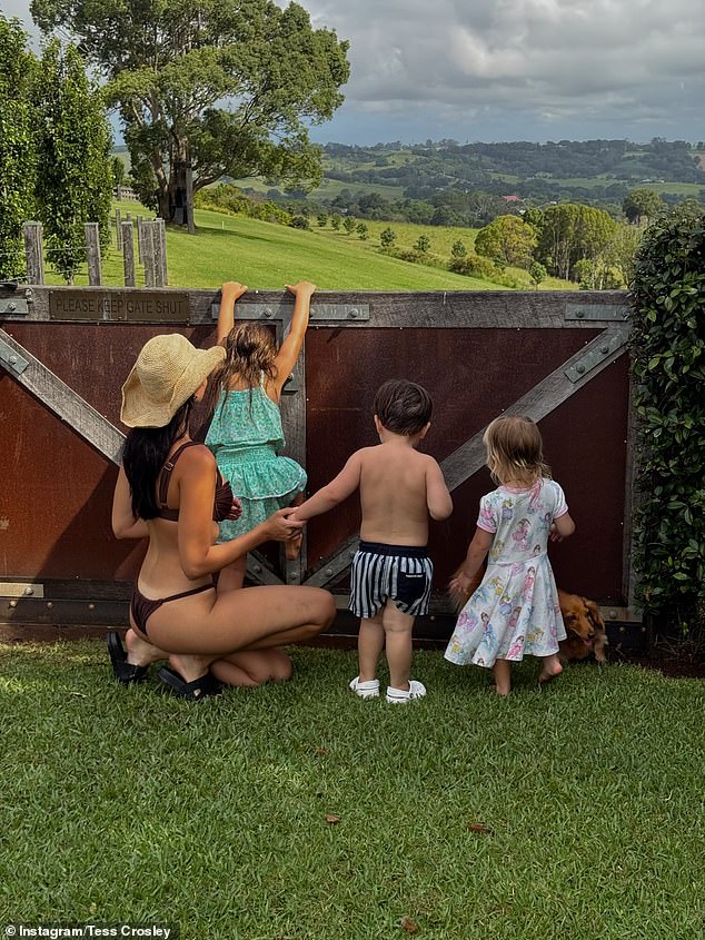 Tess posted a series of bikini-clad photos enjoying time with friends on Christmas Day in northern NSW