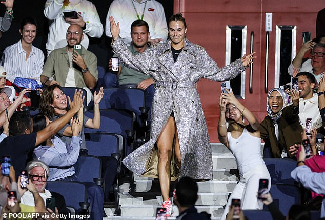 The world No 1 made a splashy entrance to 'Eye of the Tiger' in reference to her nickname