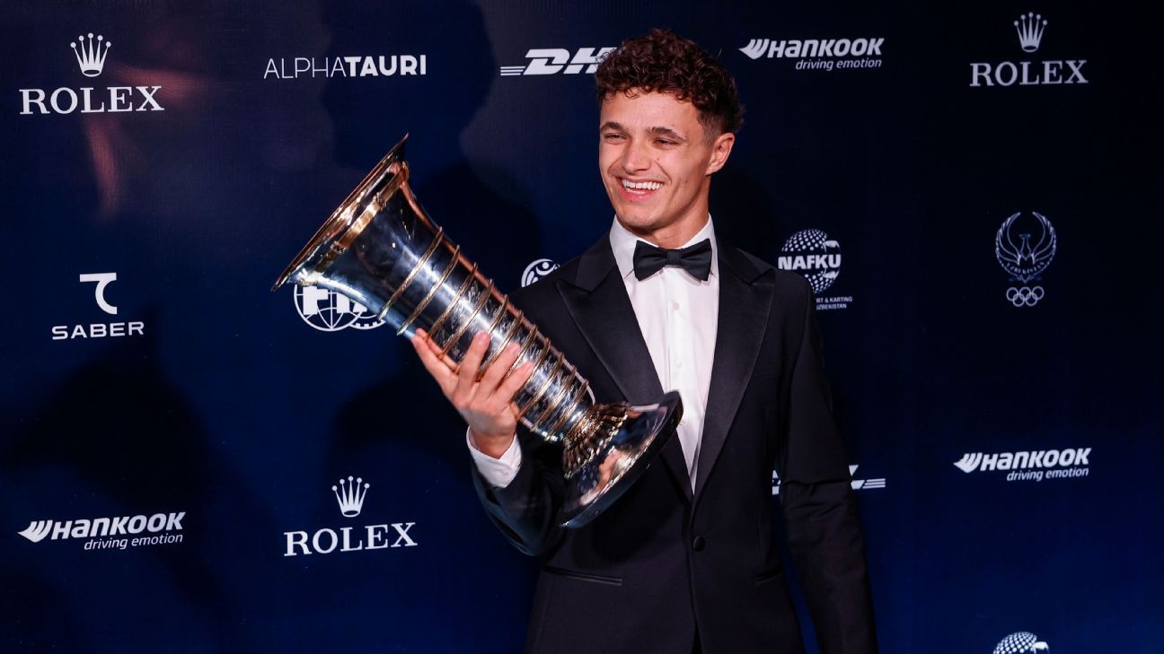 Lando Norris collects F1 championship trophy at FIA Awards