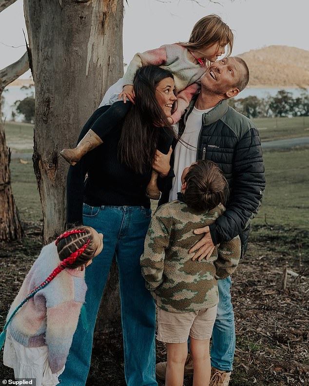 Tarsh Cooper will never forget the day she lost her husband Ash on Christmas Eve in 2024 after he was diagnosed with stage four bowel cancer. Pictured with their three kids - Ivy, 5, Hazel, 7, and Jack, 9