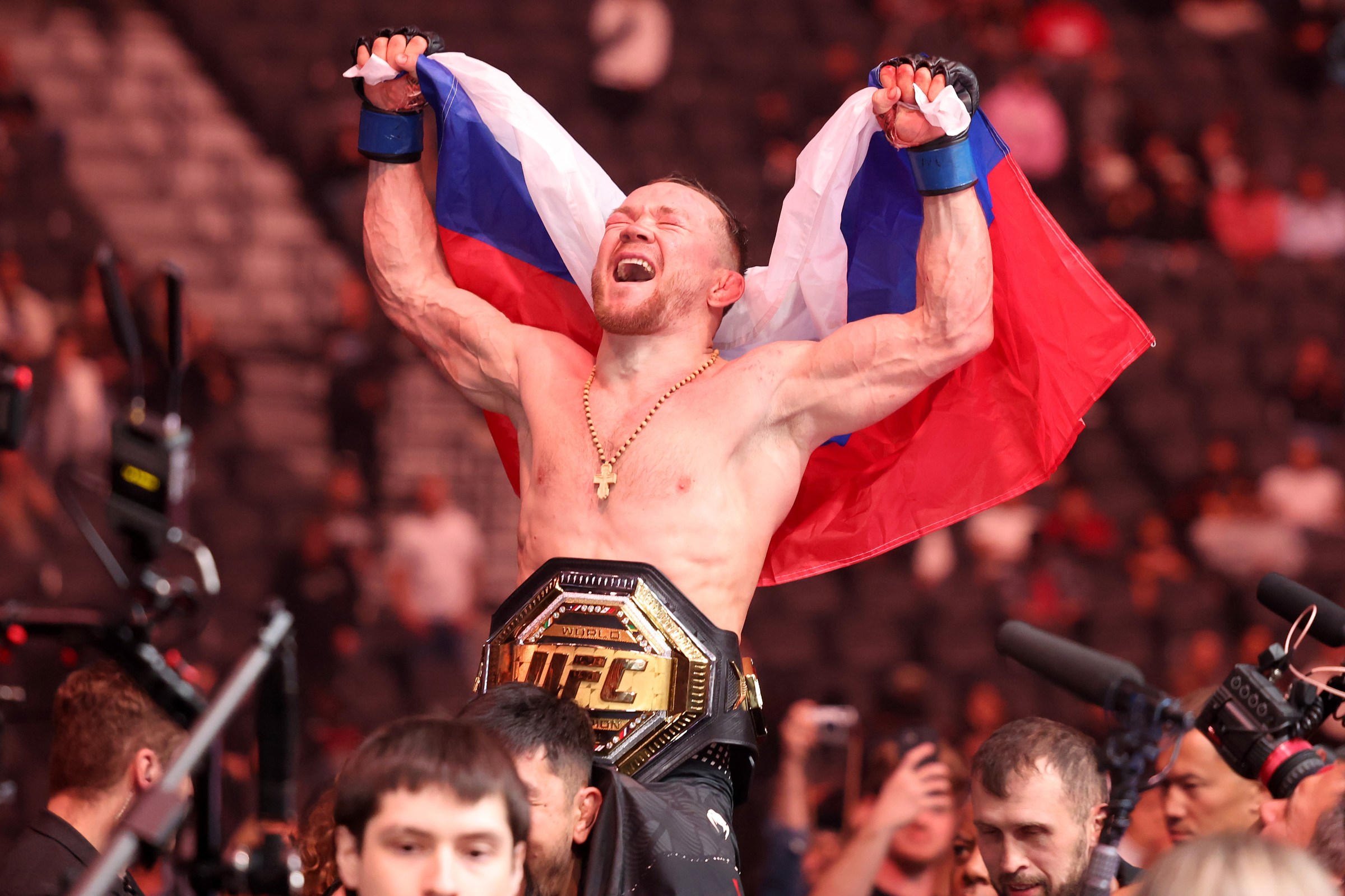 LAS VEGAS, NEVADA - DECEMBER 06: Petr Yan celebrates after defeating Merab Dvalishvili of Georgia by unanimous decision in a bantamweight title bout during UFC 323 at T-Mobile Arena on December 06, 2025 in Las Vegas, Nevada. (Photo by Ian Maule/Getty Images)