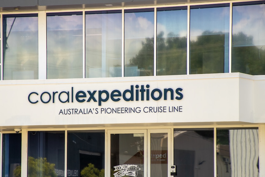 static shot of an office building in an industrial area.