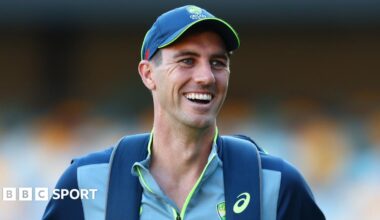 Pat Cummins looks on during a training session in Brisbane