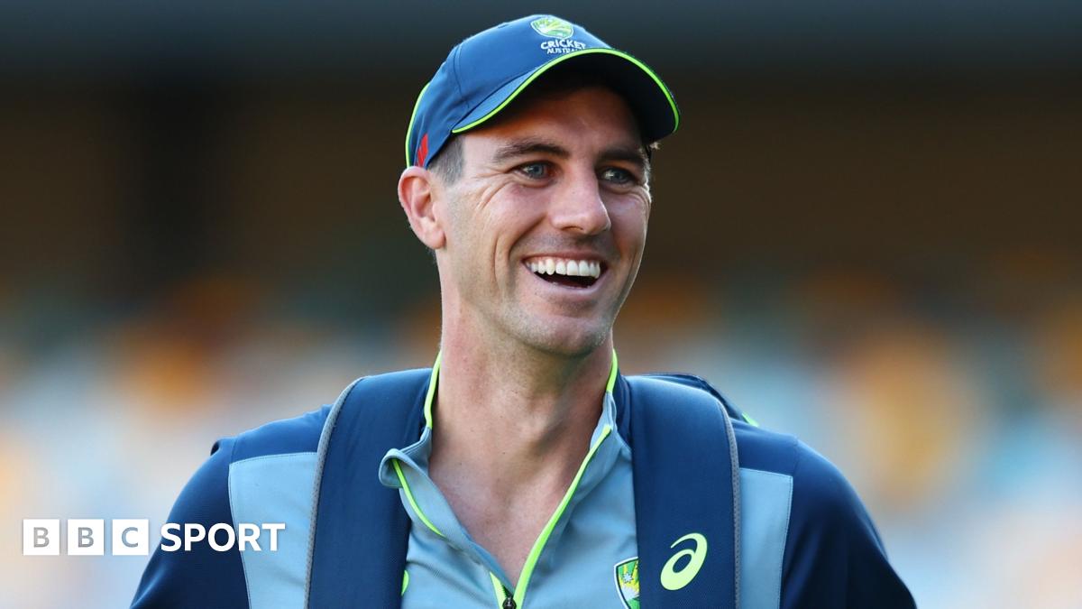 Pat Cummins looks on during a training session in Brisbane