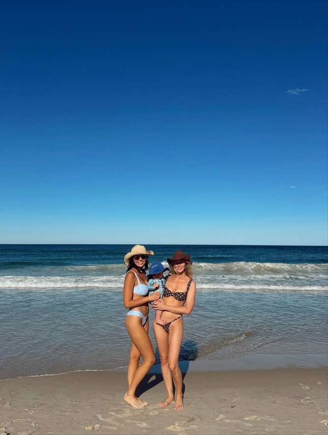 Tess Crosley and Jules Neale at the beach.