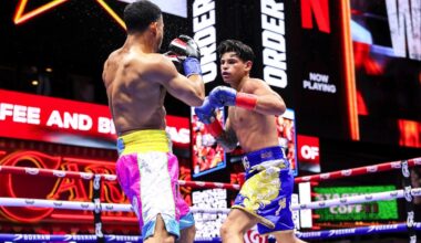 Ryan Garcia throws a right hand at Rolando “Rolly” Romero during their welterweight fight on May 2, 2025, at Times Square in New York City.