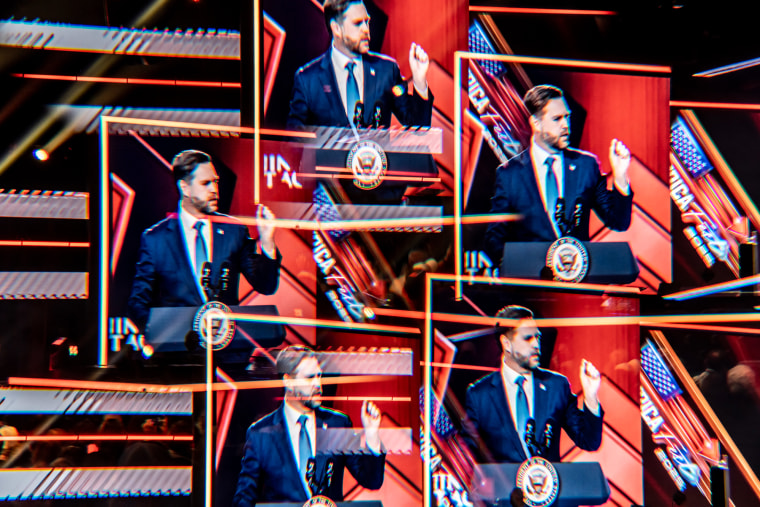 Refractions of JD Vance on a large screen